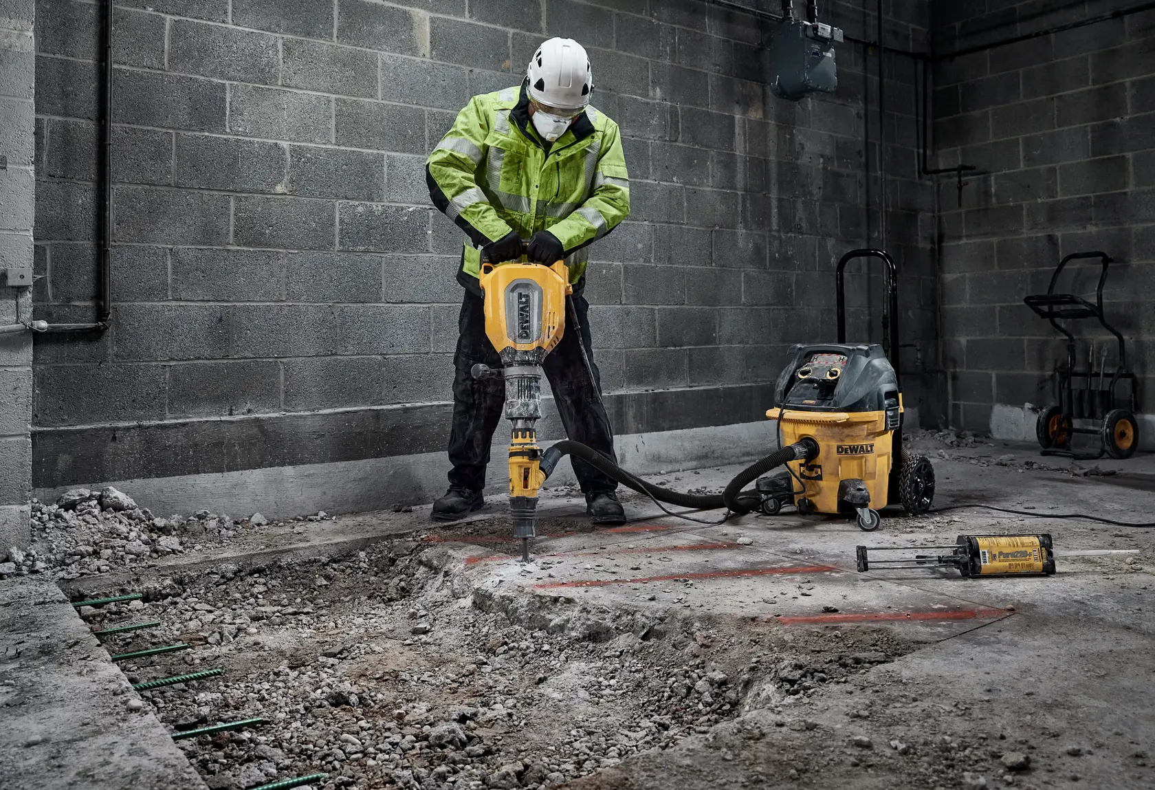 Image of a DEWALT demolition hammer model D25911K with highlighted features including SDS Max tool holder, wireless tool control, shock absorption technology, and a variable speed dial.