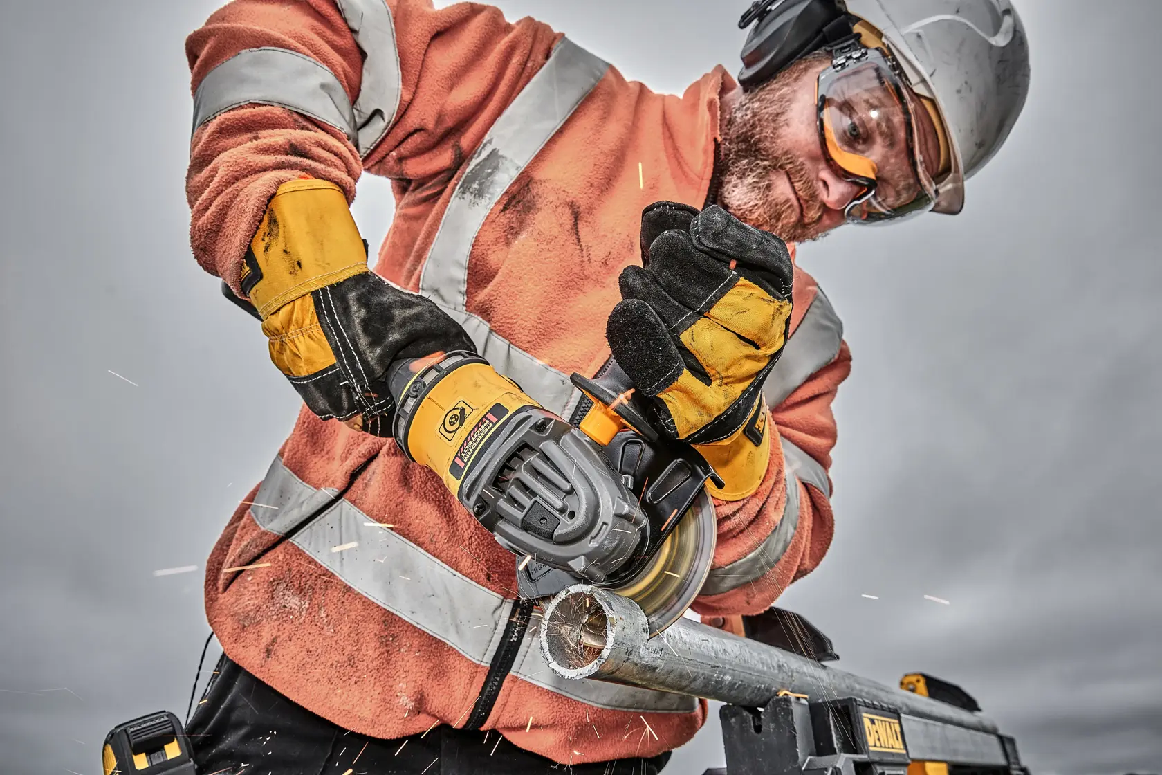 Graphic showing DEWALT XTREME Sub-Compact Series branding with the slogan 'Compact and Performance Packed' on a yellow background.