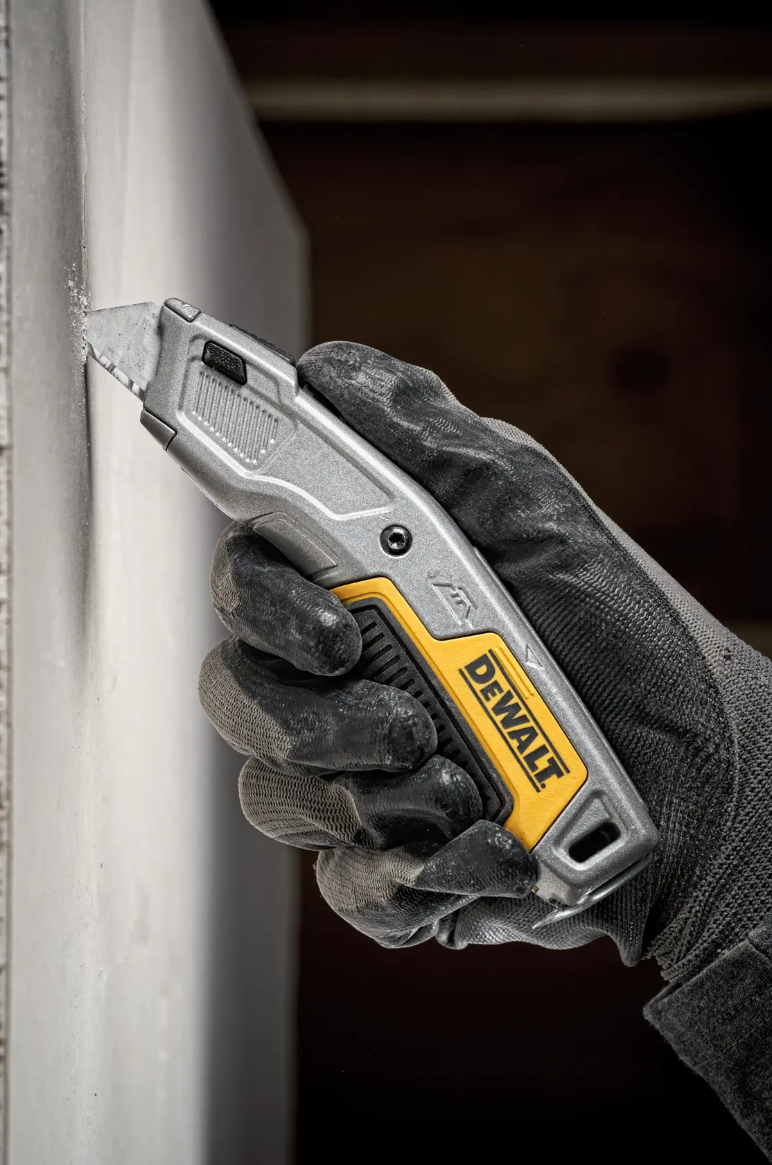 Coltello da demolizione DEWALT® a corpo fisso con lama retrattile