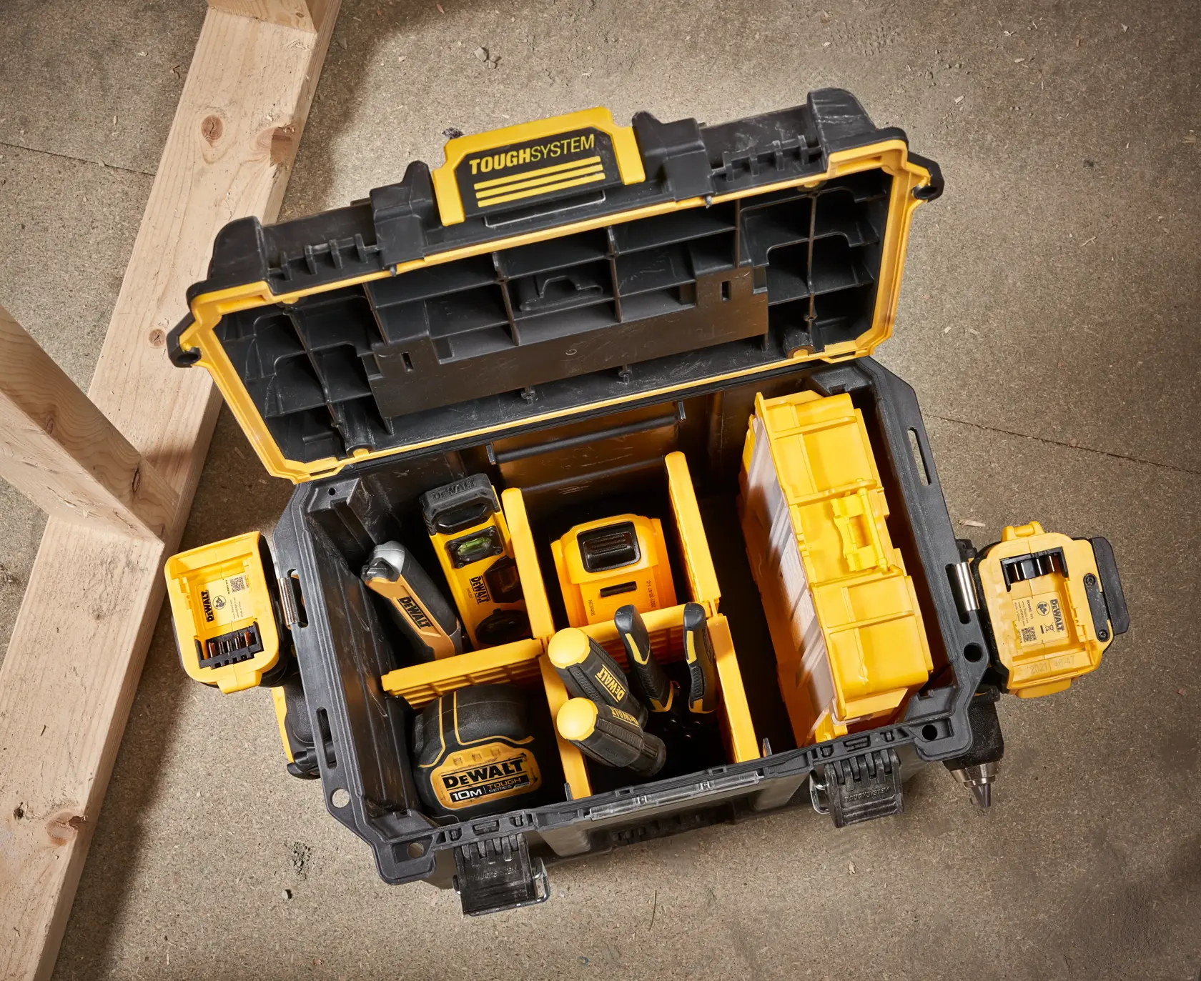 DEWALT ToughSystem 2.0 promotional graphic with the slogan 'Storage Built to Handle It' in large, bold yellow lettering on a dark, textured background.