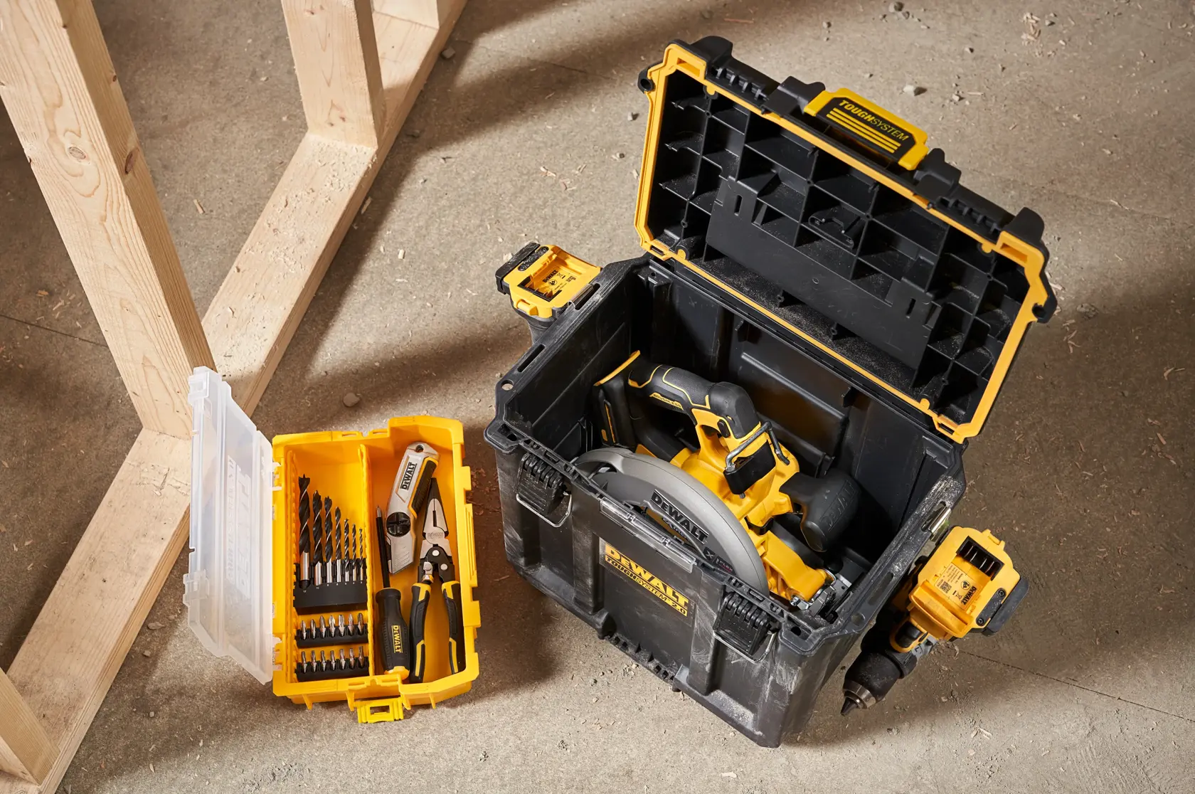 DEWALT ToughSystem 2.0 promotional graphic with the slogan 'Storage Built to Handle It' in large, bold yellow lettering on a dark, textured background.