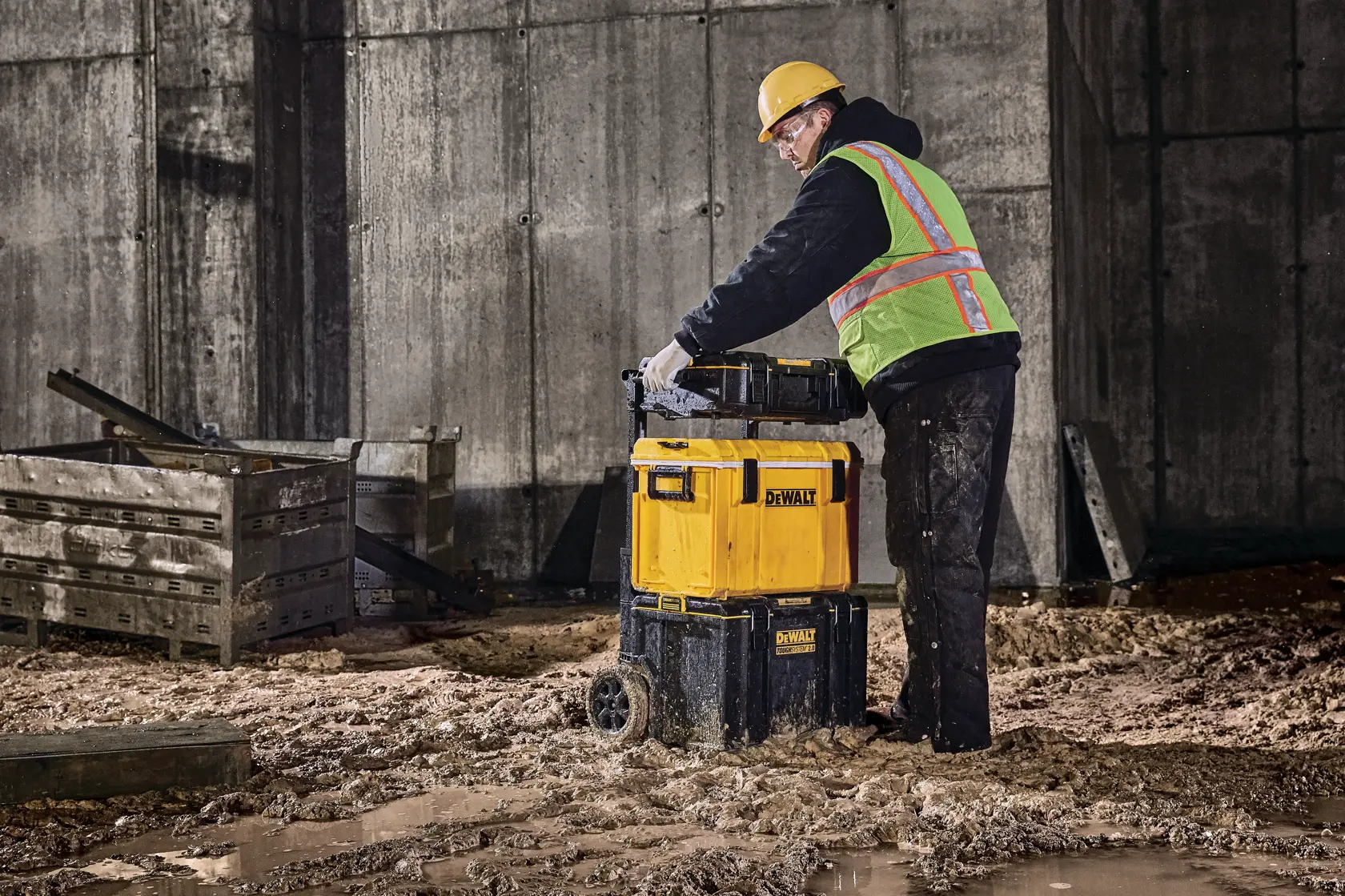 DEWALT ToughSystem 2.0 promotional graphic with the slogan 'Storage Built to Handle It' in large, bold yellow lettering on a dark, textured background.